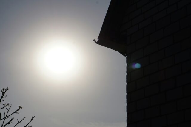 Sun near the house